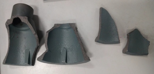 Original Jaguar E-Type jack after compression testing ASP baggage bar resting on 3D printed jig edited